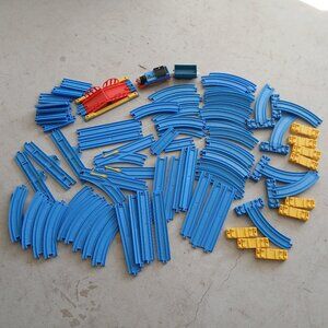 Tomy Train Tracks 77 Pieces & Train with Cargo Car (read)